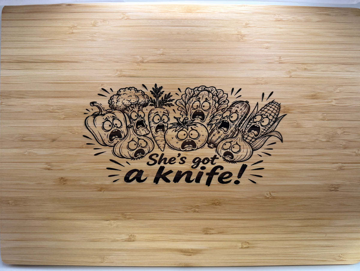 Bamboo Cutting board "she's got a knife veggies"